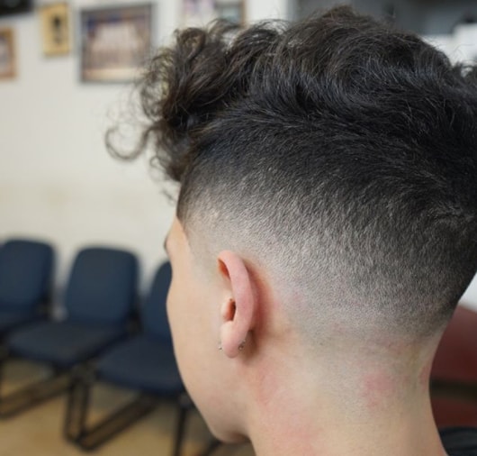 Wild Loose Wavy Hairstyle with Drop Fade