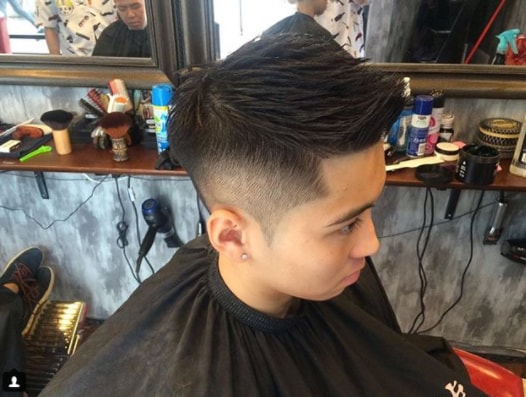Mid Fade with Short Faux Hawk Haircut