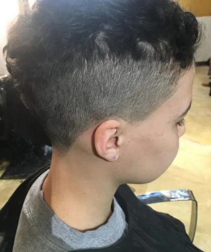 Natural Short Curl with Mid Fade