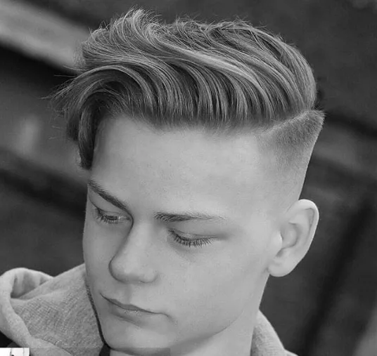 Wavy Hairstyle with Shaved Side for Boys