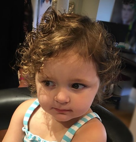 Cute Girl with Curly Bob