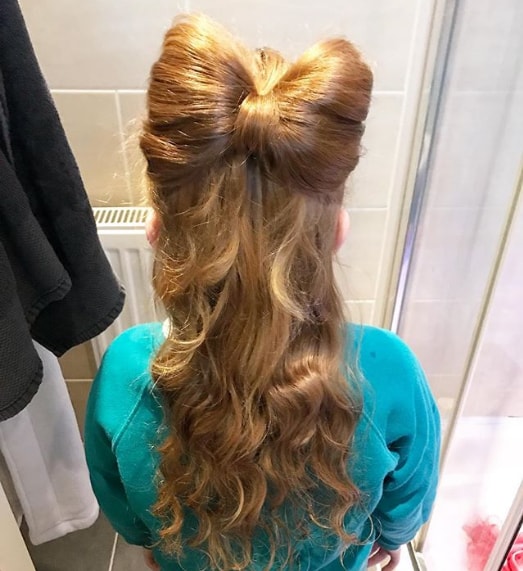 elegant bun with long wavy girl hairstyle