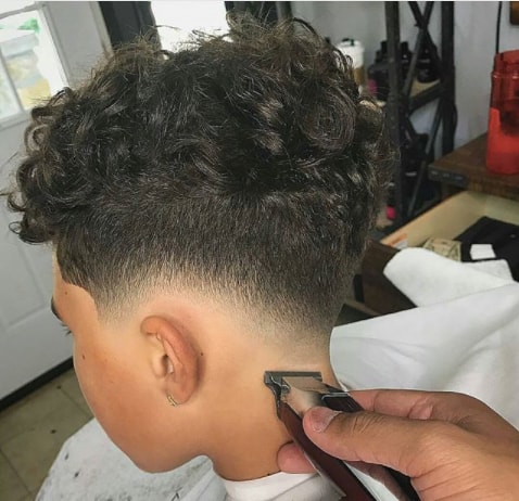 Messy Curls On Top With Low Fade