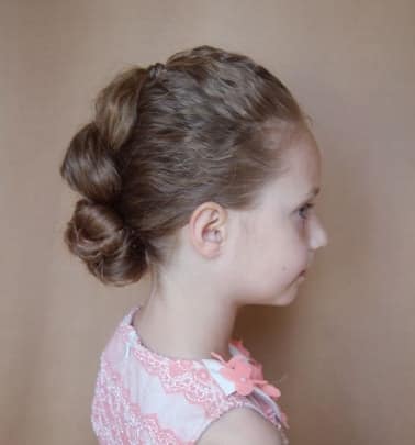 Combed Back Hair With Twisted Bun