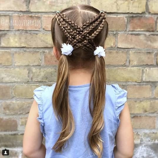 Centre Parted Hairstyle With Cross Braids At The Back