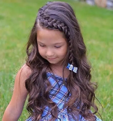 Long And Wavy Hairstyle With A Braided Fringe