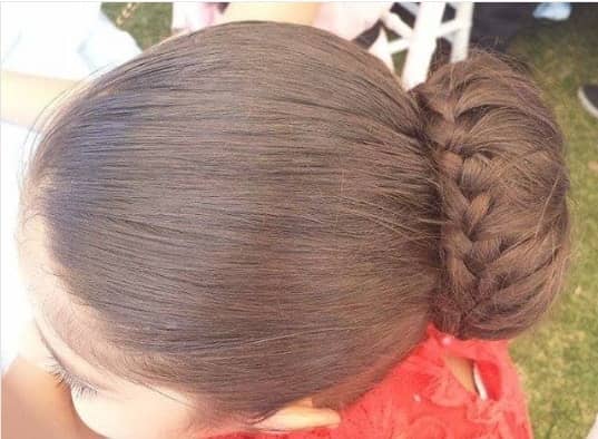 Simple Combed Back Hairstyle With Braided Bun