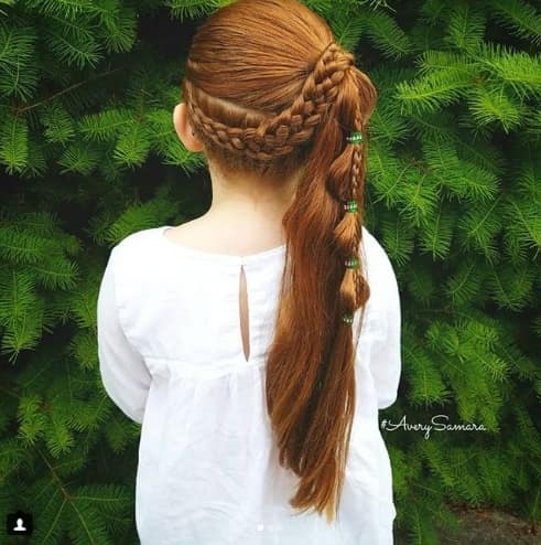 Thick Braid With A Long Ponytail On A Side