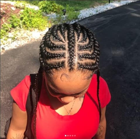 Swirling Cornrows With A Center Braid