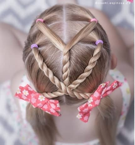 Centre Parted Hairstyle With Braided Design