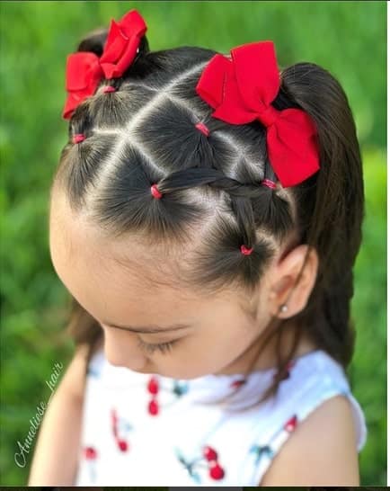 Centre Parted Hairstyle With Pigtails