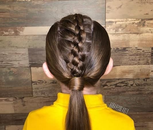 Combed Back Look With A Centred Braided Ponytail