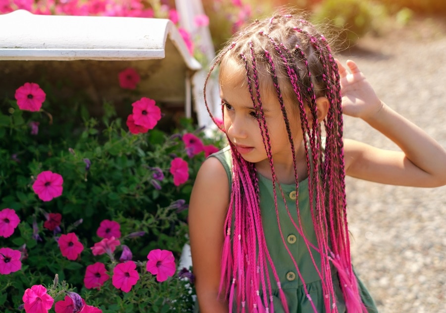 little girl with long braid hairstyle