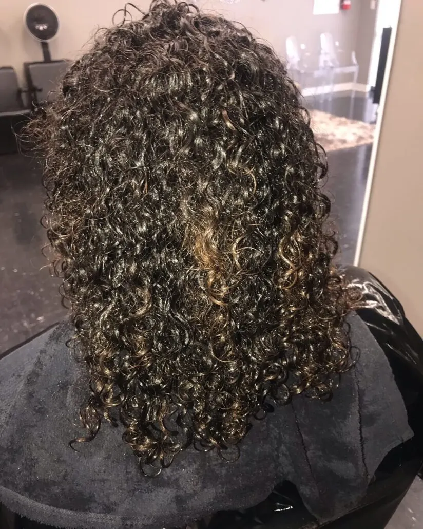 Long Open And Naturally Curly Hairstyle