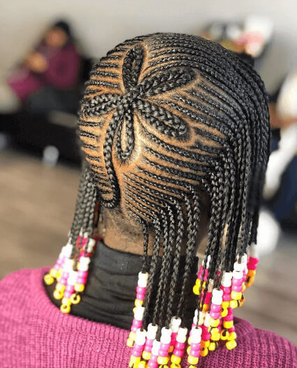 Long Braided Cornrows With Beaded Tails And Design