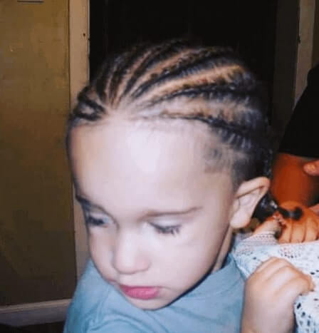 Combed Back Hairstyle With Cornrows And Bun