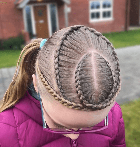 Combed Back Hairstyle With Braided Design And Ponytail
