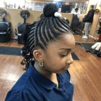 Swirling Cornrows With Top Bun And Ponytail