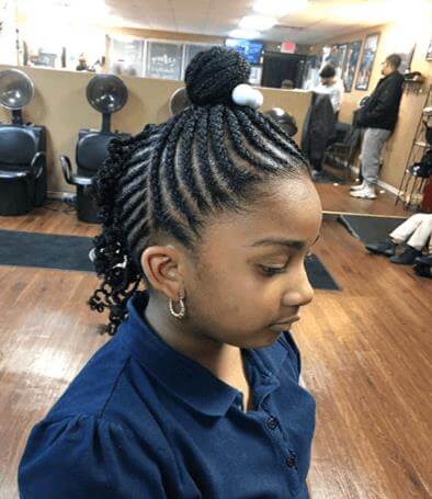 Swirling Cornrows With Top Bun And Ponytail