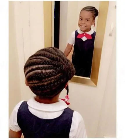 Angled Cornrows With Side Bun And Short Pony