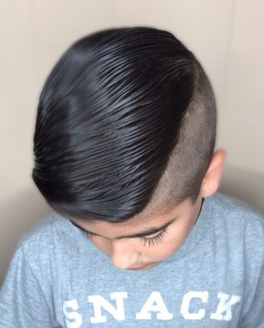 Textured Side Swept Hairstyle With Disconnected Undercut