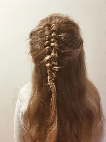 Tightly Knotted Braided Ponytail