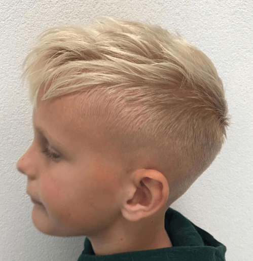 Textured Combed Back Hairstyle With Mid Fade