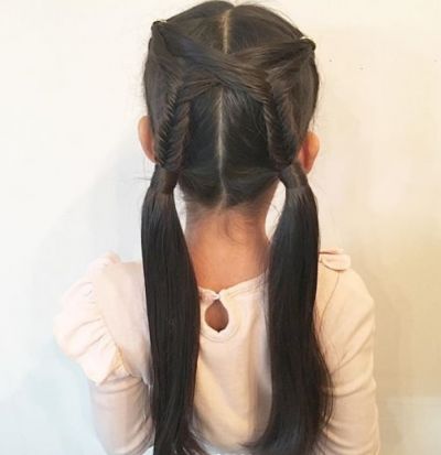 23.   Center Parted Hairstyle With Crossed Layers And Braids At The Back