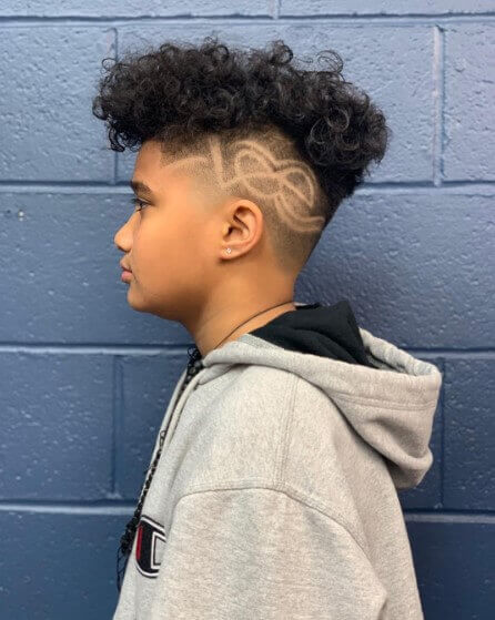Blown Out Curly Top With Disconnected Fade And Design