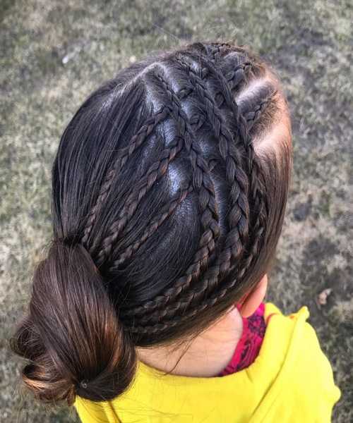 Combed Back Hairstyle With Braided Design And Bun 