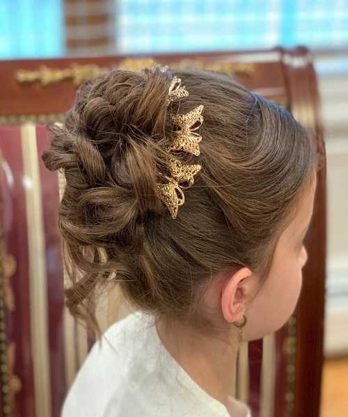 Combed Back Hairstyle With Messy Bun