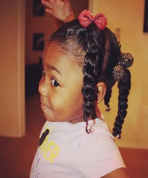Combed Back With Multiple Braided Ponytails