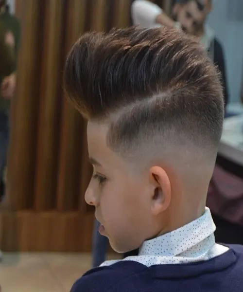 Edgy Combed Over Quiff With High Fade