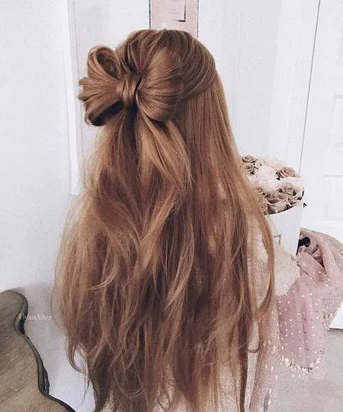 Statement Bow With Long Messy Back