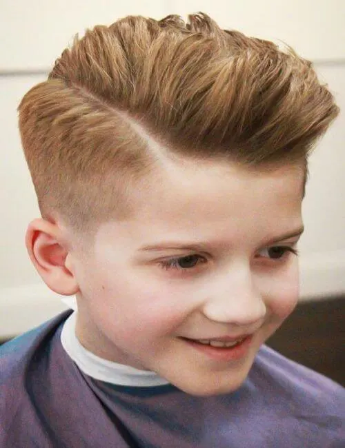 Angled Brushed Back Hairstyle With A High Fade