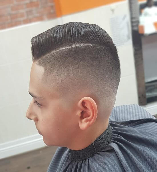 Comb Over Hairstyle With A Low Drop Fade