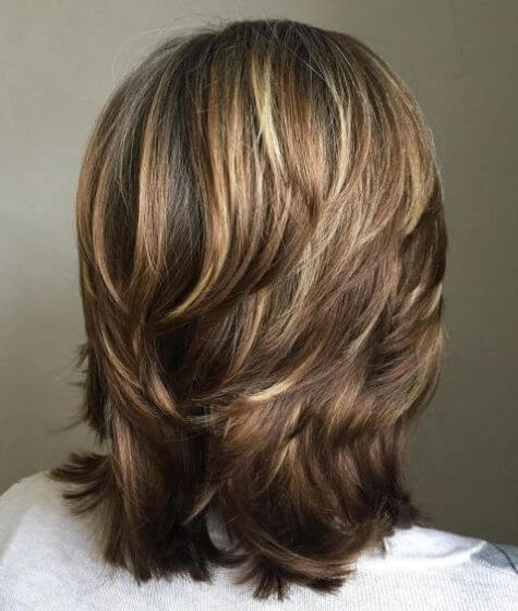 Medium Length Haircut With Short And Choppy Layers