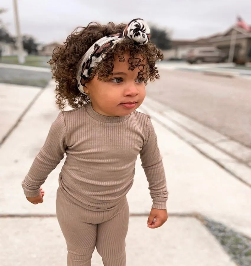 Natural Curls With Hair Accessory