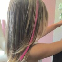 Layered Hair Style With Pink Strip