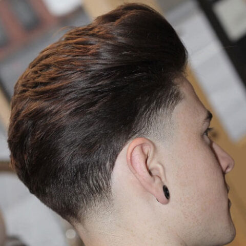 Brushed Back Hairstyle With Classic Low Taper 480x480 