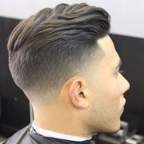 Textured Slick Back Hairstyle With Taper Fade 480x480 