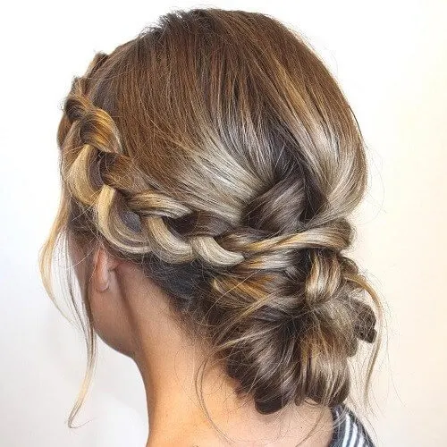 Low Hair Bun With A Medieval Braid