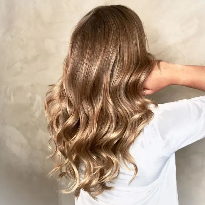 Light Brown Hairstyle With Wavy Tips