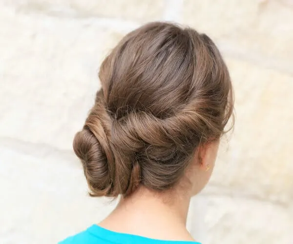 Combed Back Hairstyle With Low Bun