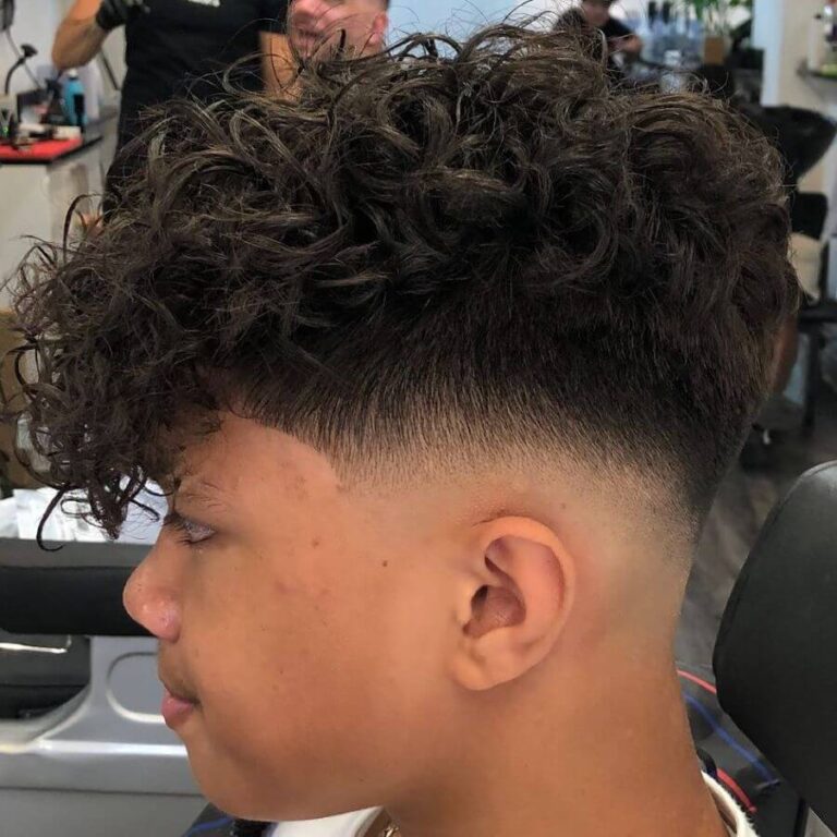 40 Best Low Fade Haircuts For Kids To Try In 2024   Messy Curls On Top With Low Fade 768x768 