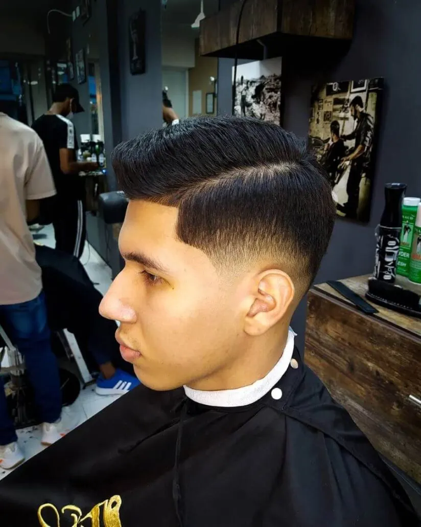 Side Swept High-Top Haircut With Fade