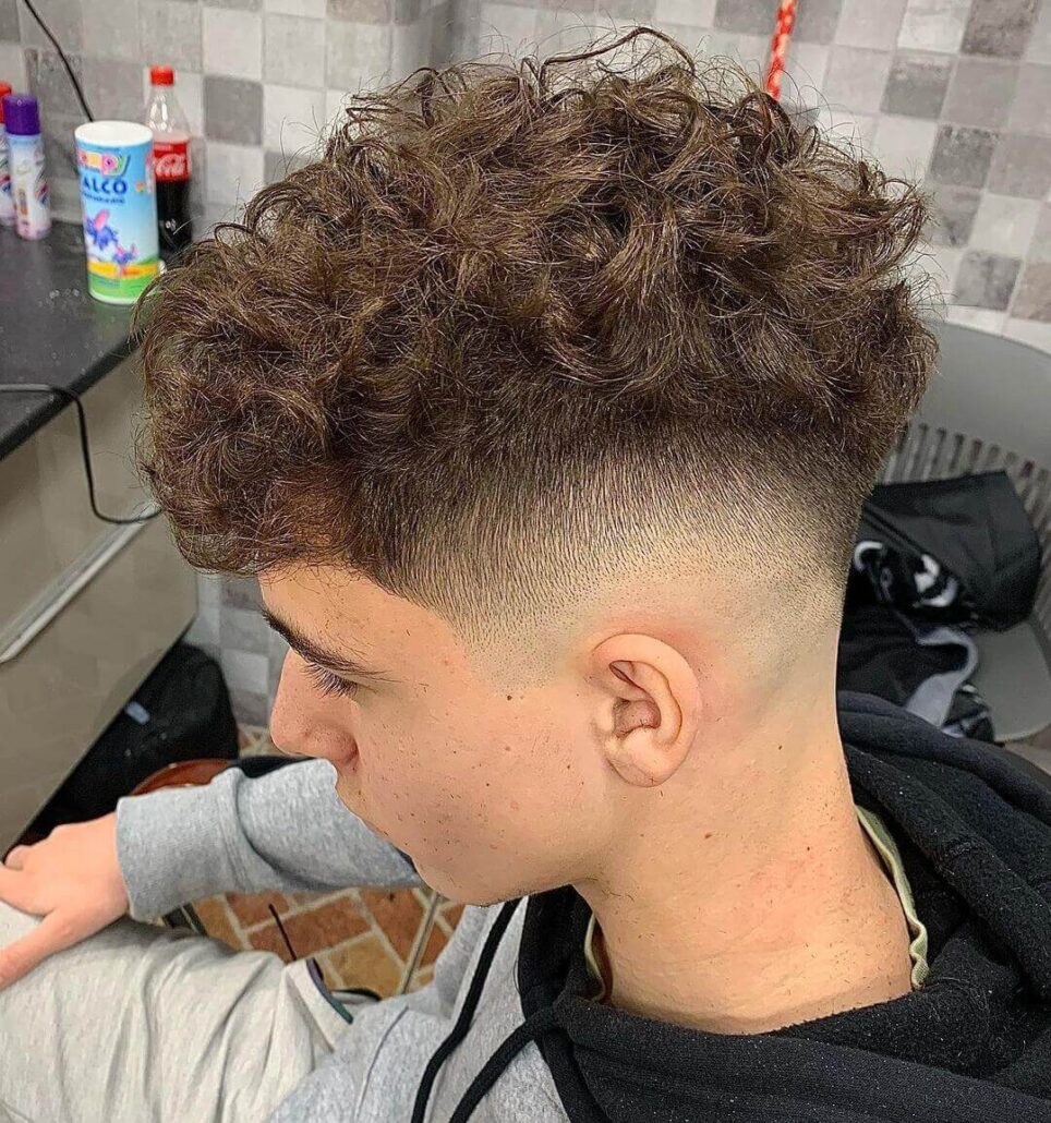 Curly Mess With Bald Fade