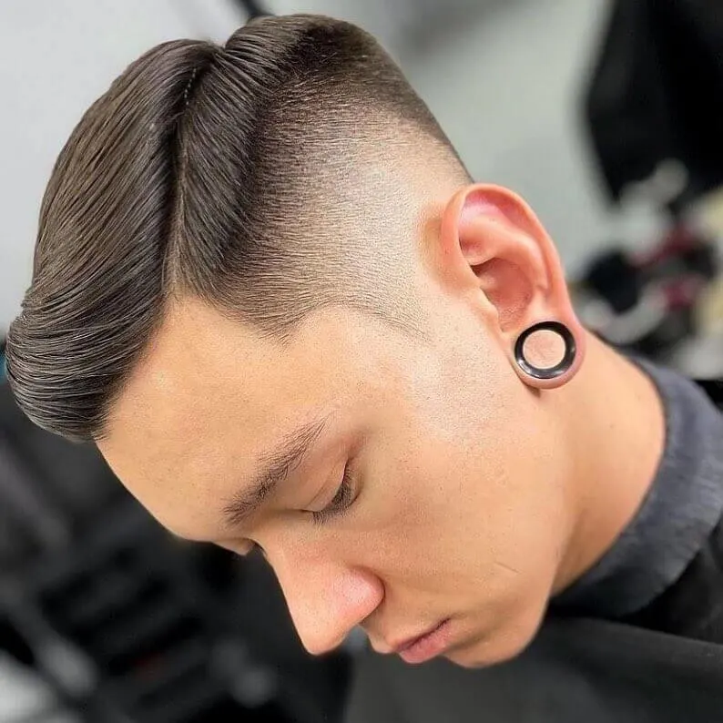 Side-Swept Hairstyle With High Fade