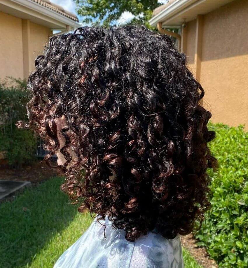 Messy Curls With Brown Highlights