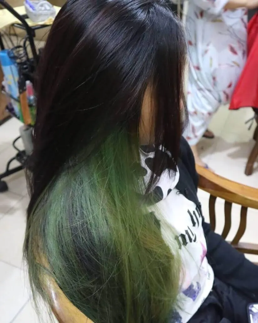 Cool Hairstyle With Emerald Highlights